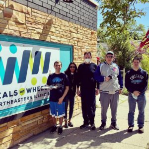 GADOL adults and staff outside meals on wheels