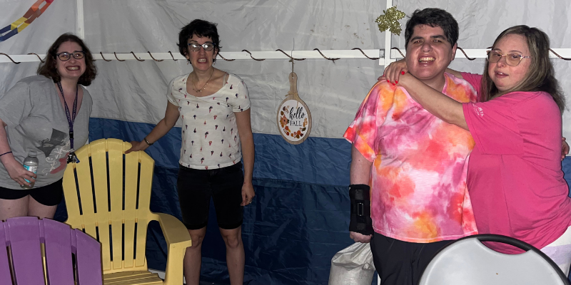 Residents hanging out in the sukkah together
