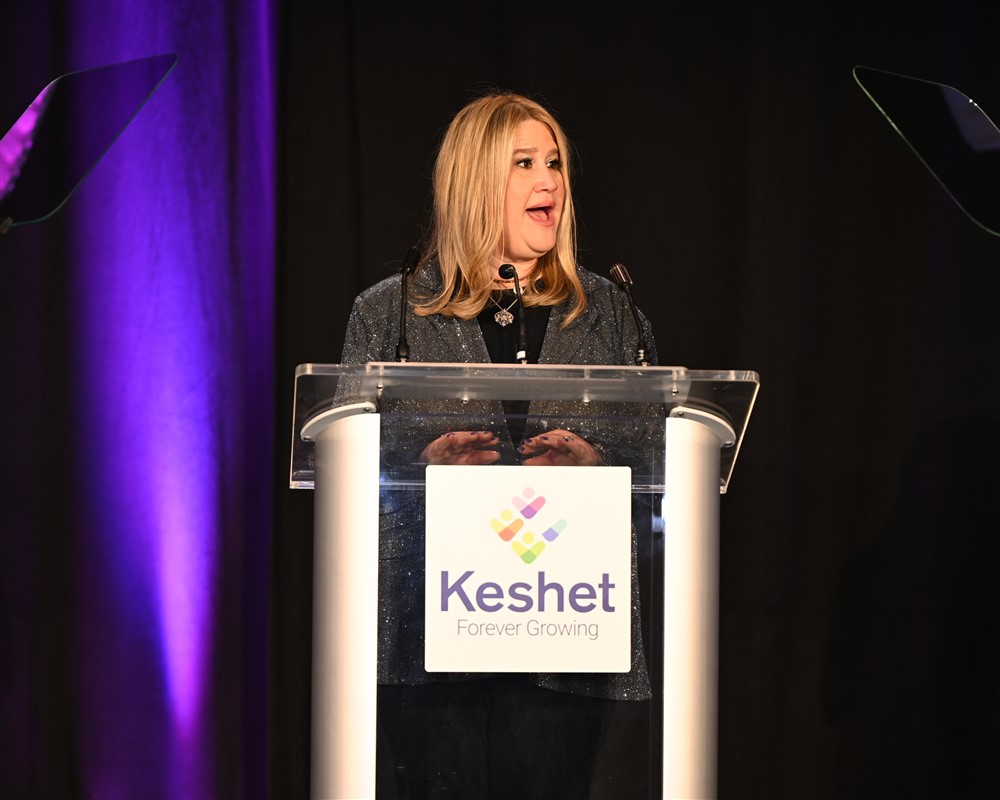 Jen speaking at the banquet