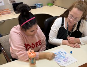 Keshet student and Robyn working on the sanctuary activity together