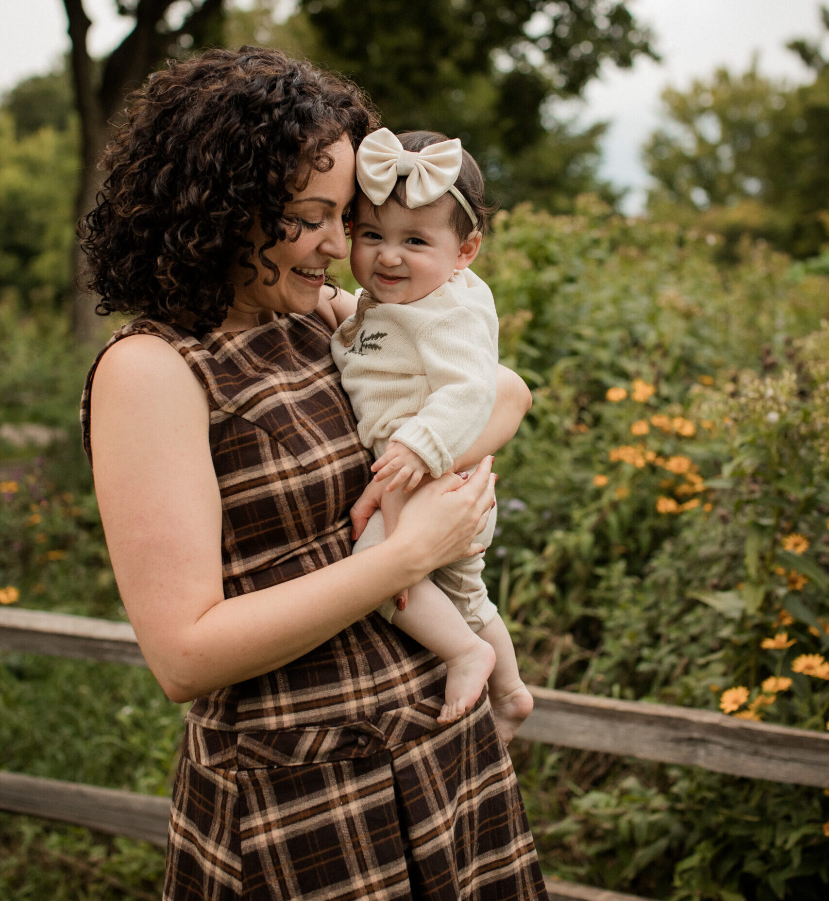 Lexi holding her daughter
