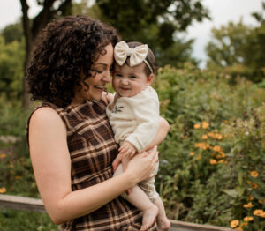 Lexi holding her daughter