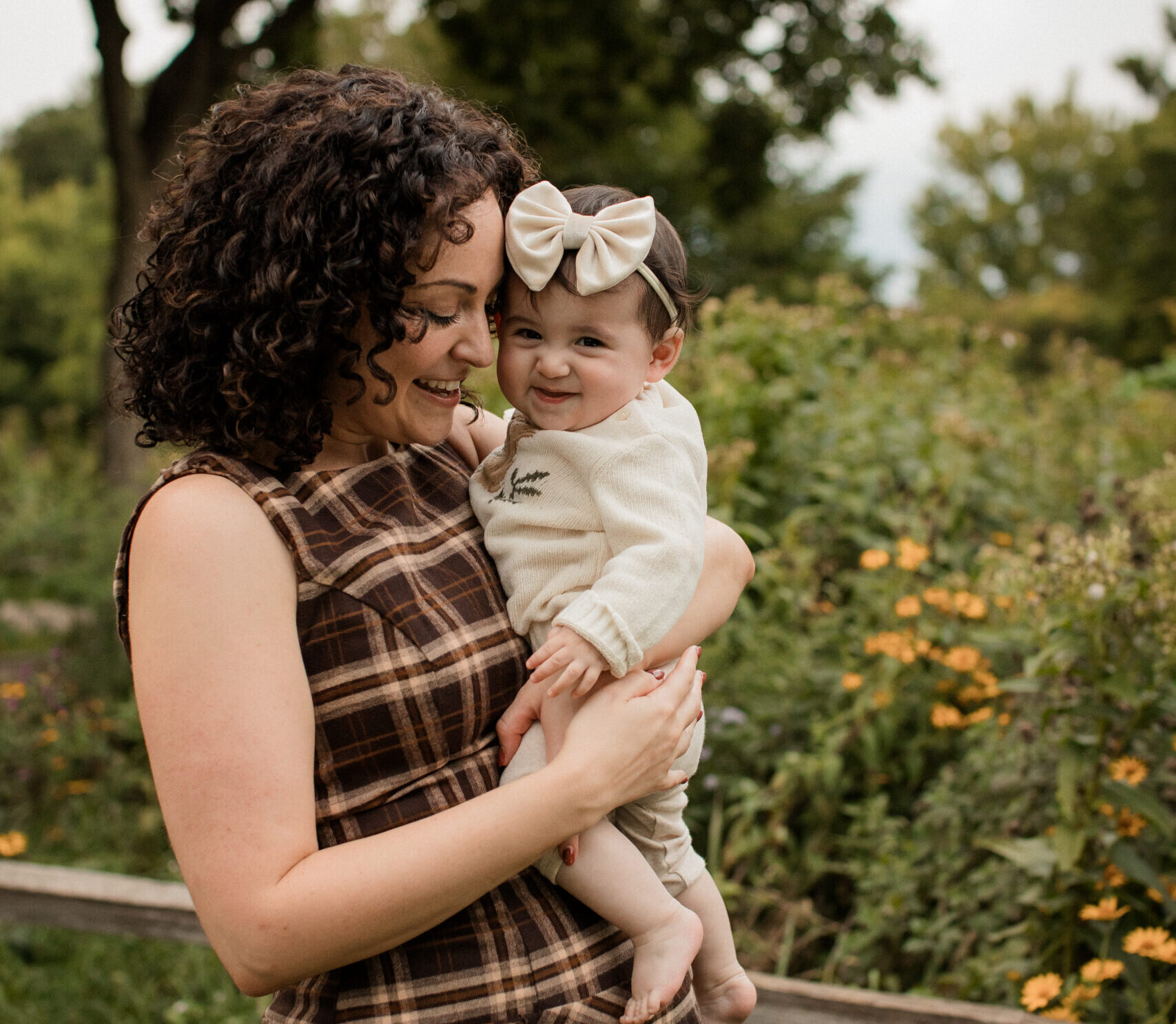 Lexi holding her daughter