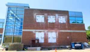 East wall of building showing space for 5 new windows
